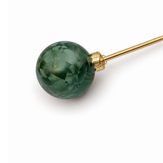 Dekorationsstik med grøn perlemorkugle